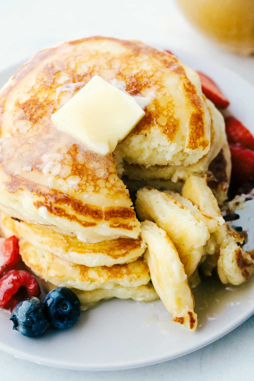 Top view of pancakes on a plate.