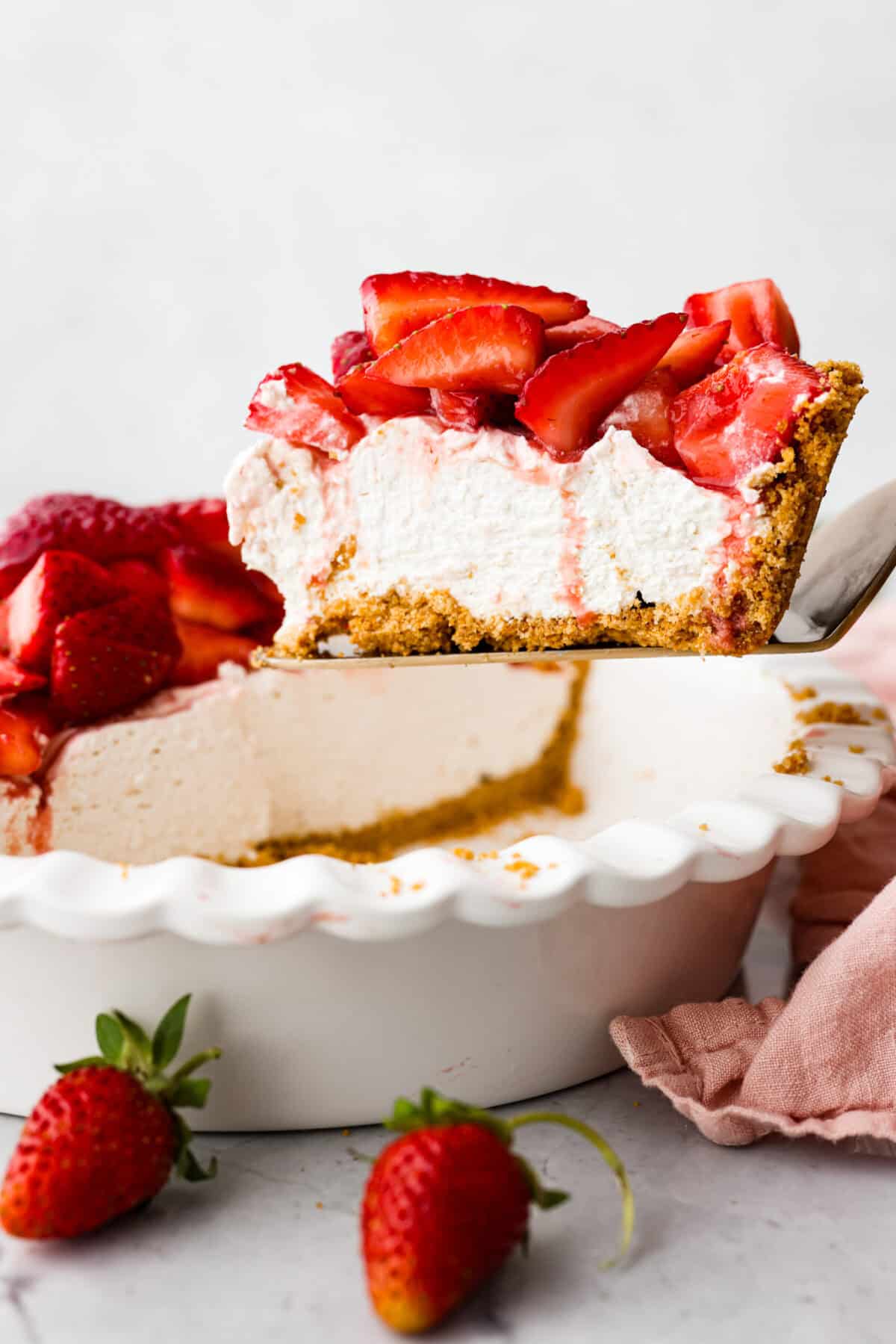 Side view of slice of pie being lifted out of pie dish