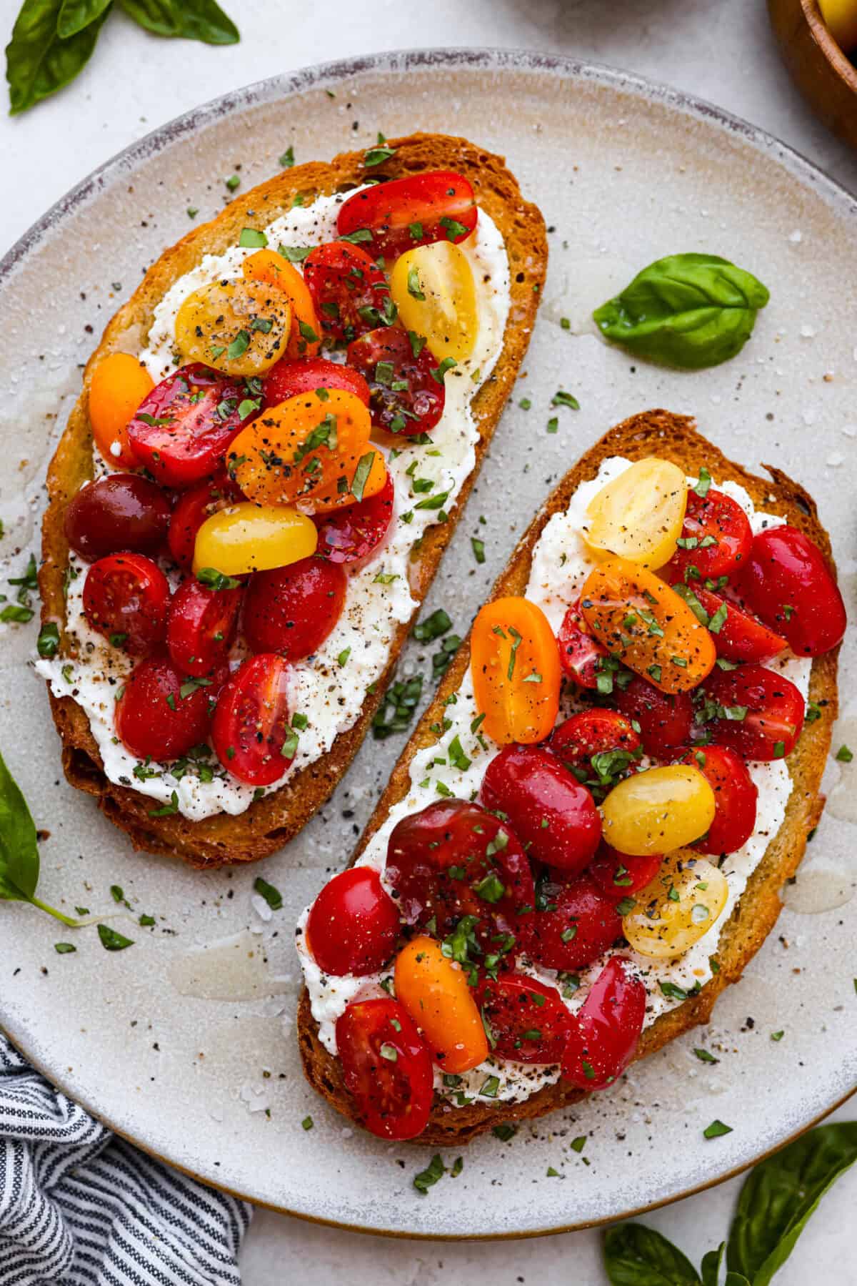 Overhead shot of plated tomato toast. 