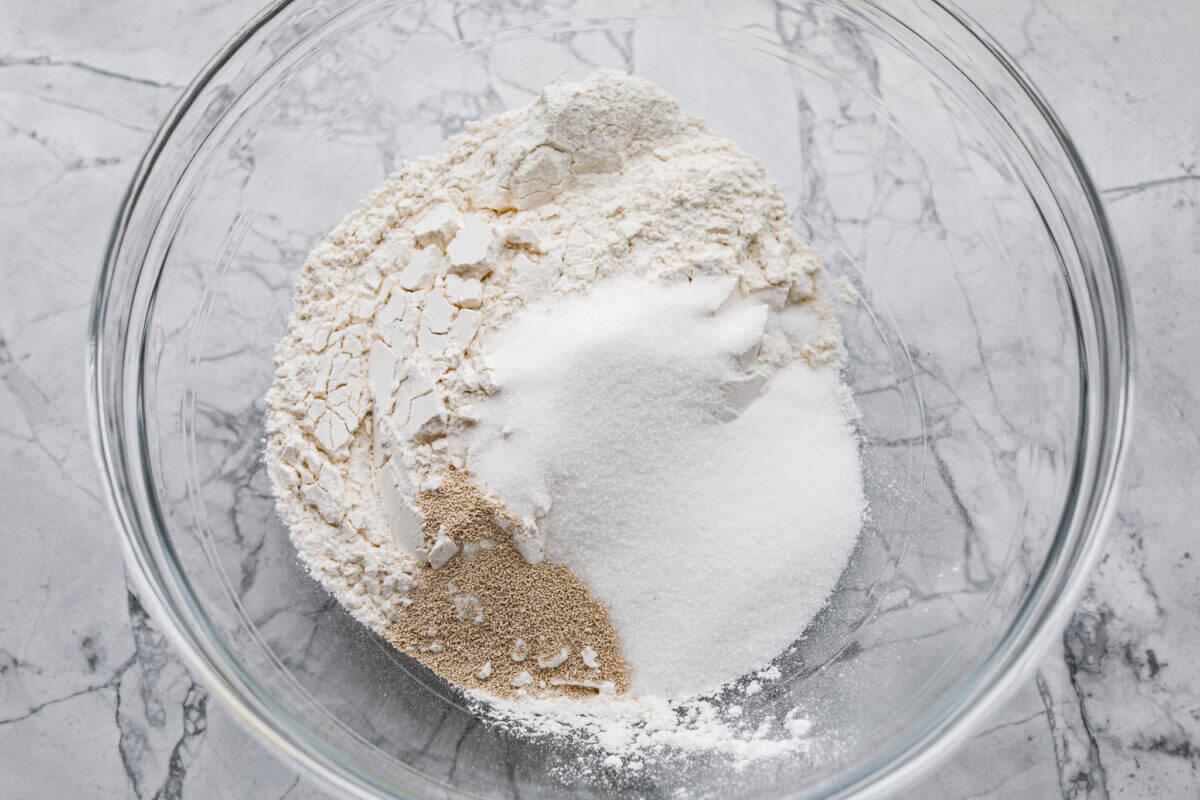 Overhead shot of a glass bowl with dry ingredients. 