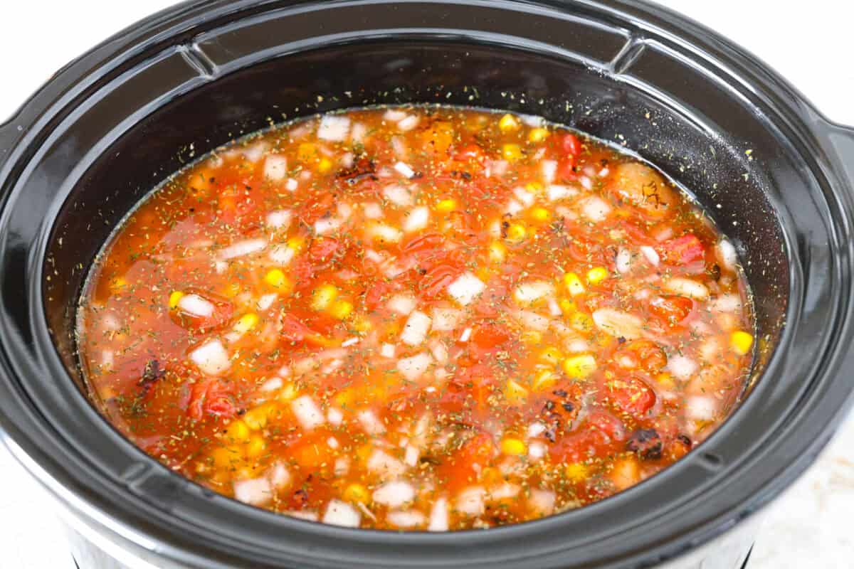 Overhead shot of all the ingredients stirred up in the crockpot. 