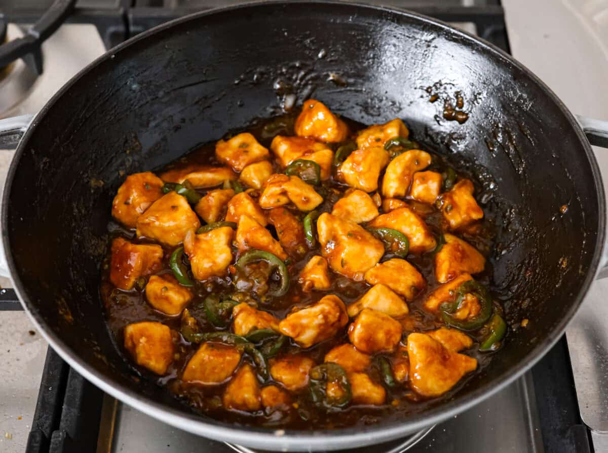 Overhead shot of cooked jalapeño chicken in a skillet.