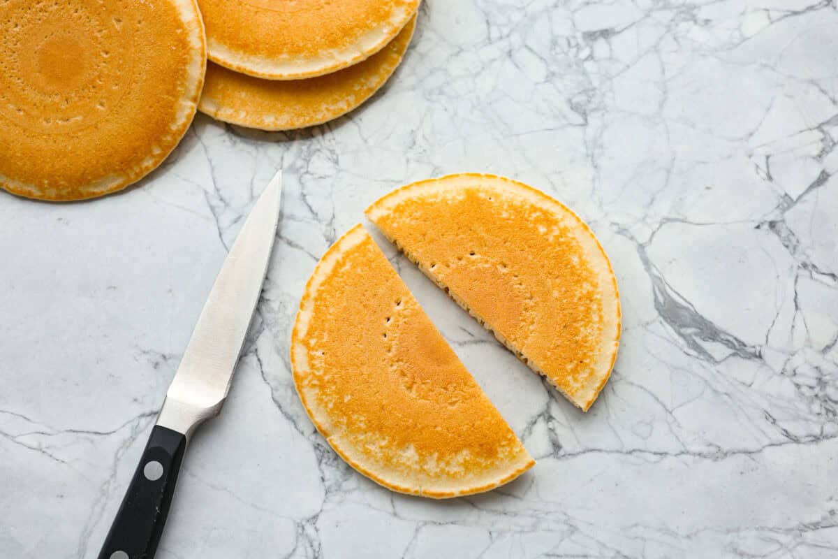 Overhead shot of a pancake cut in half.