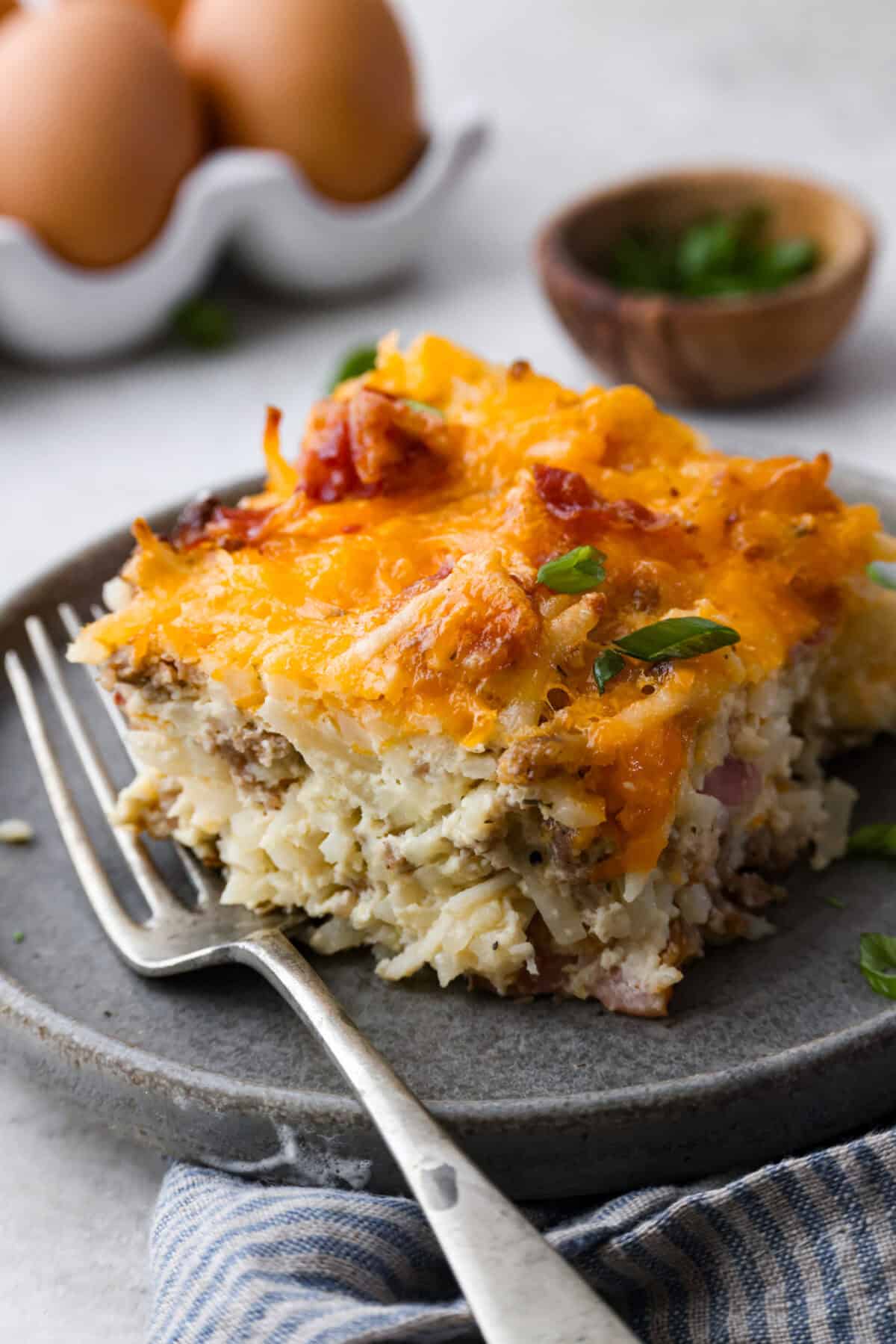 Close up shot of a plated portion of crack breakfast casserole. 