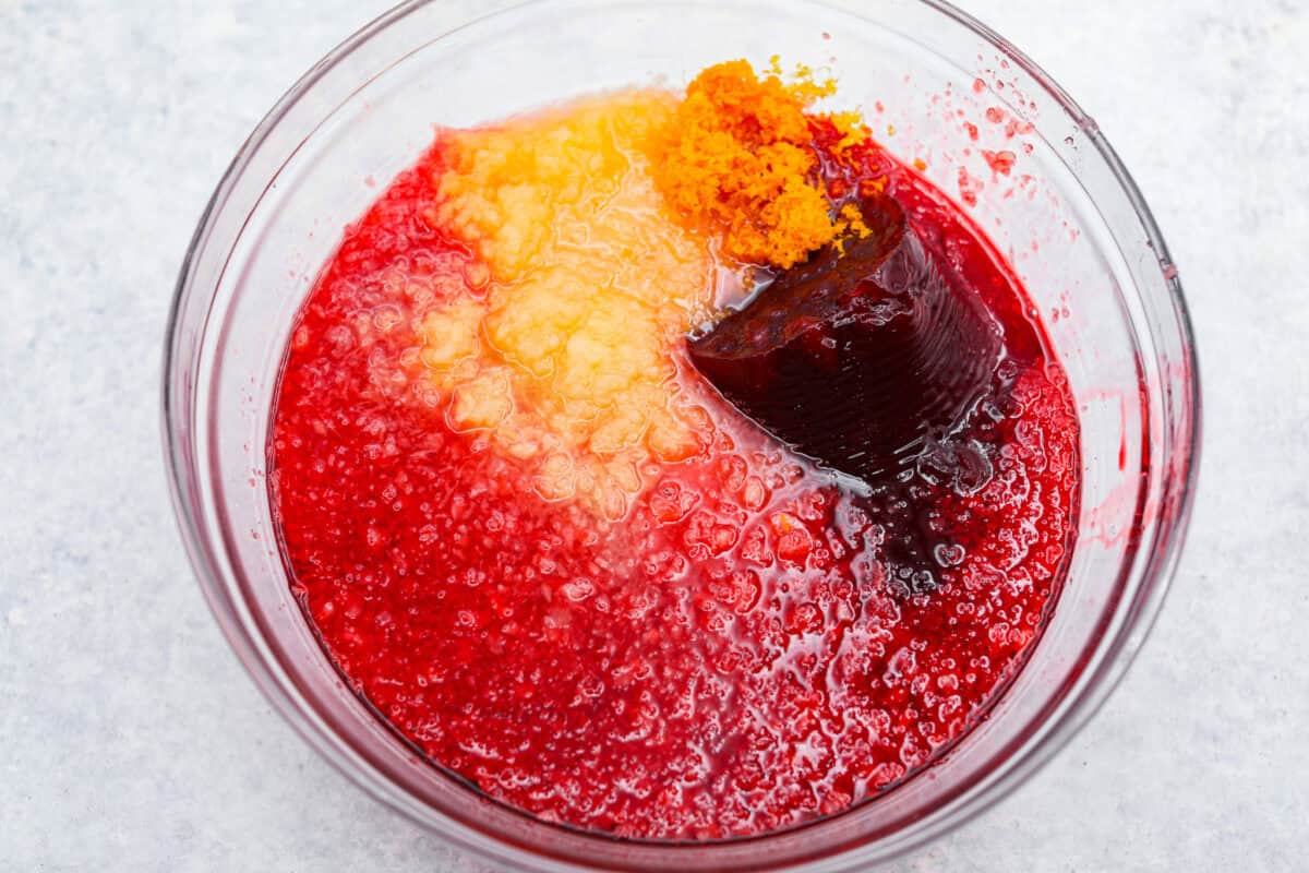 Overhead shot of the jello salad ingredients in a mixing bowl. 