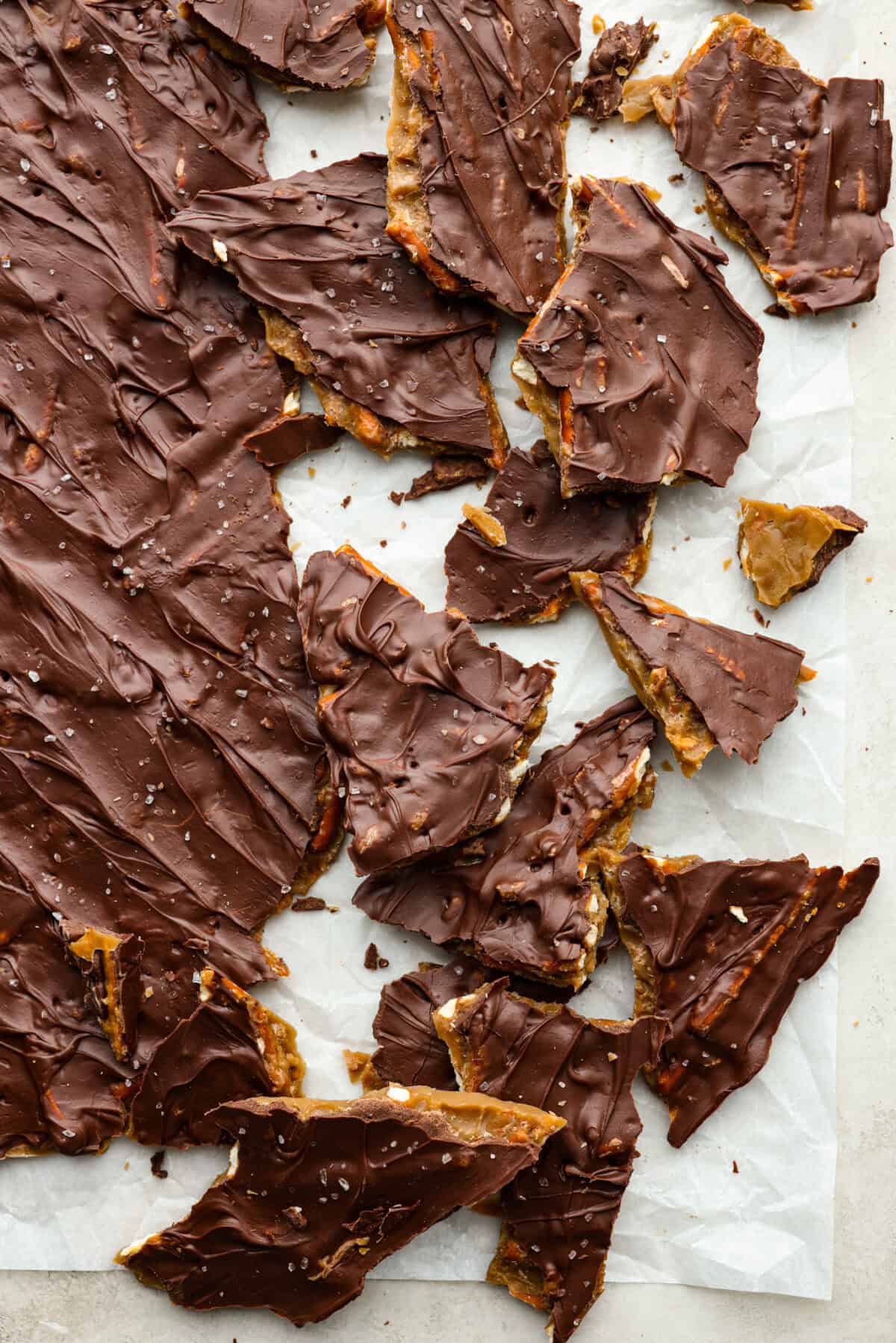 Overhead shot of broken up pieces of pretzel Christmas crack. 