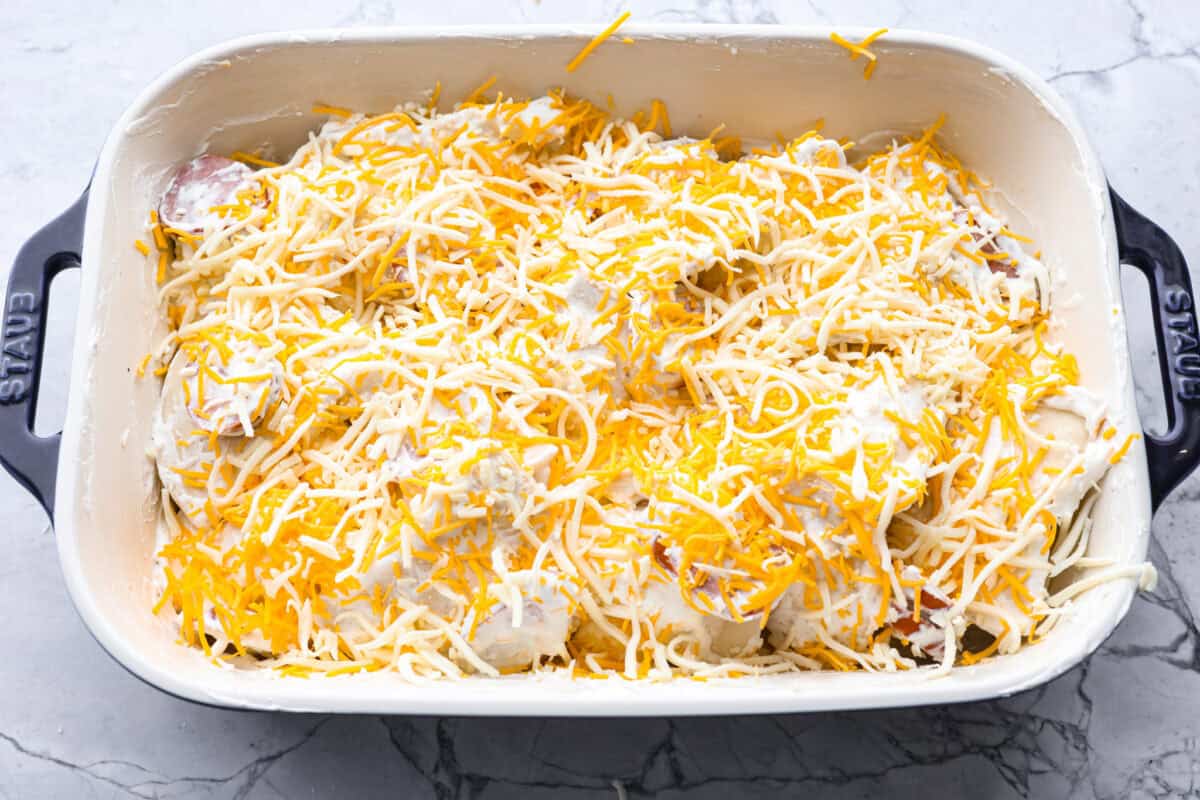 Pierogi casserole ingredients mixed together ready to go in the oven. 