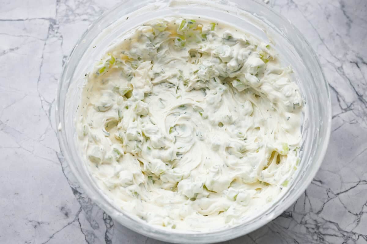 Cucumber, ranch seasoning and fresh dill added to the cream cheese and sour cream mixture. 