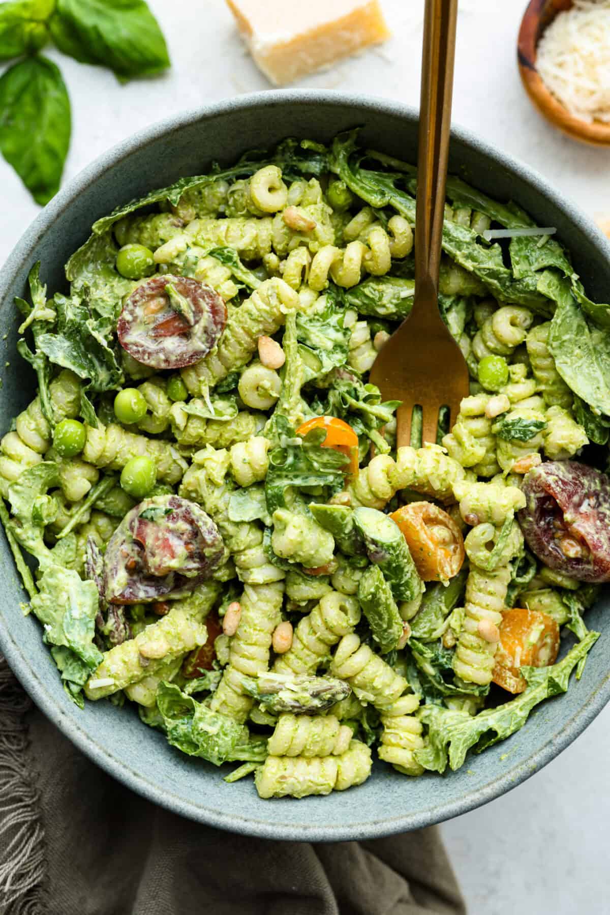 Overhead shot of a bowl of green goddess pasta salad. 