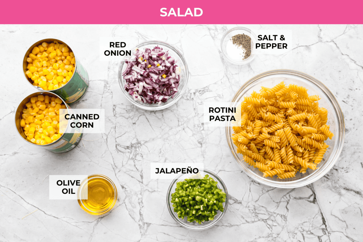 Overhead shot of labeled salad ingredients. 