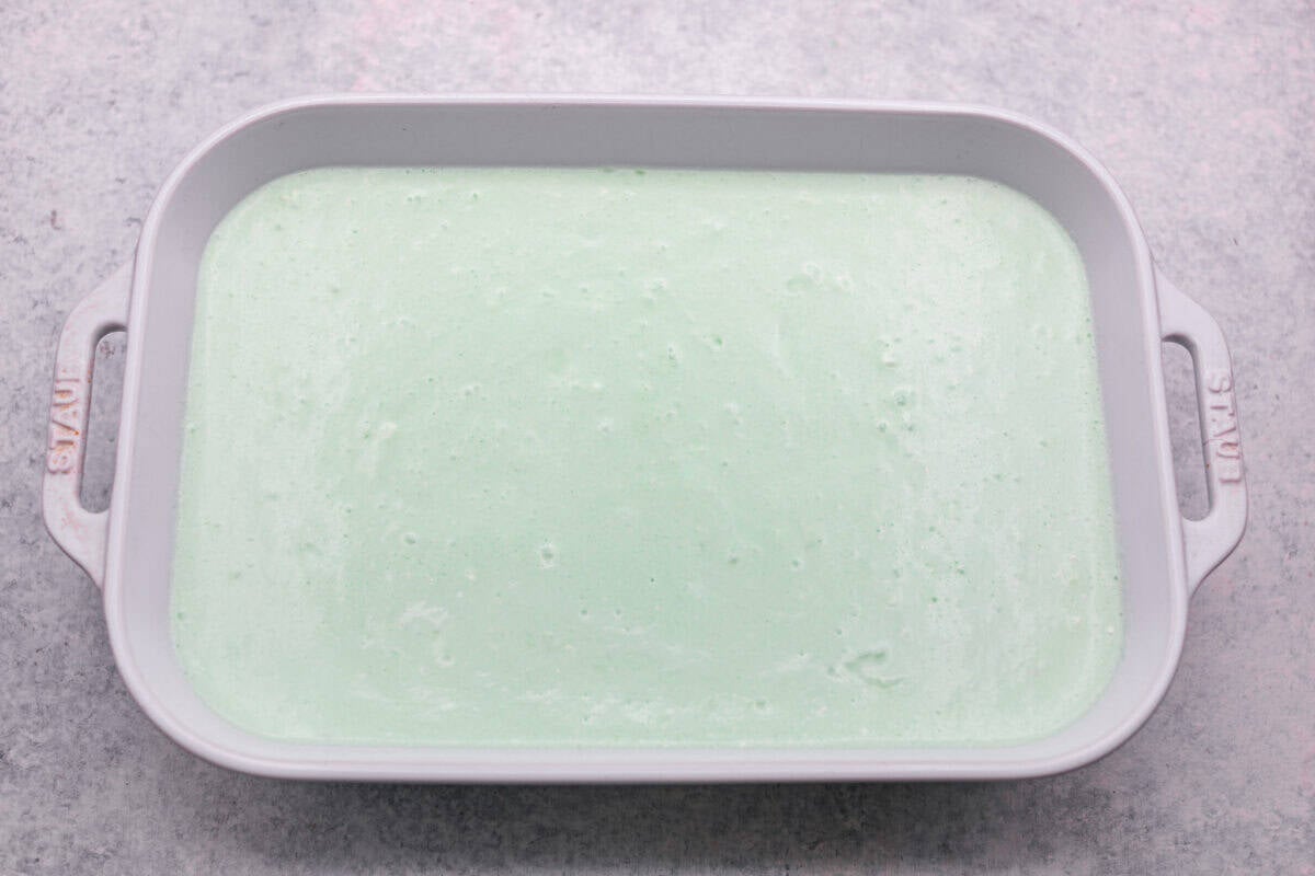 All of the lime jello salad ingredients mixed together and added to the prepared baking dish. 