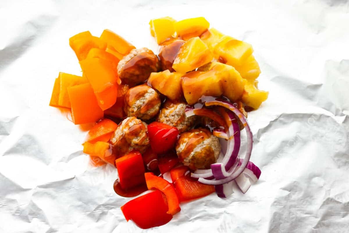 Teriyaki sauce drizzled over the meat and veggies. 