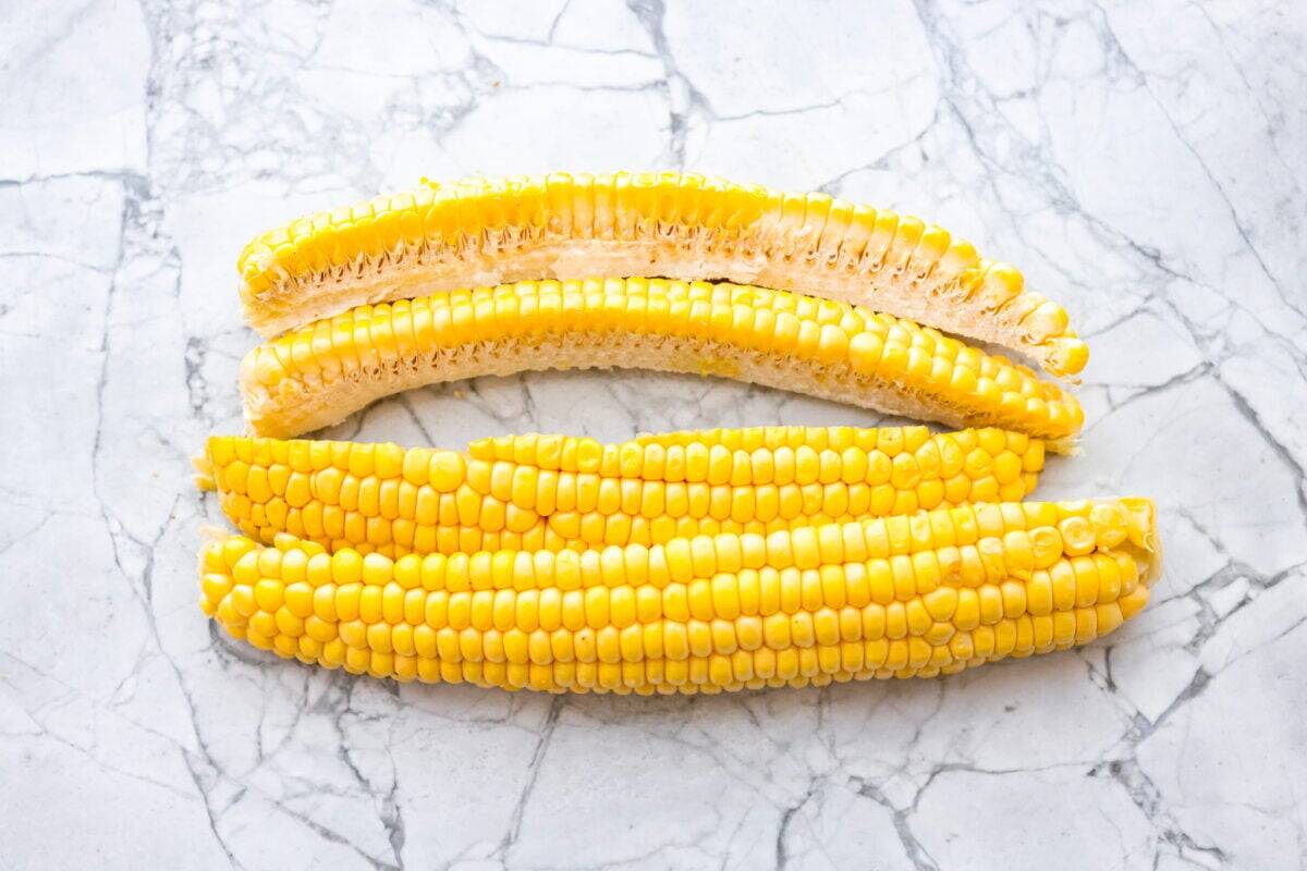Corn cob cut into fourths. 