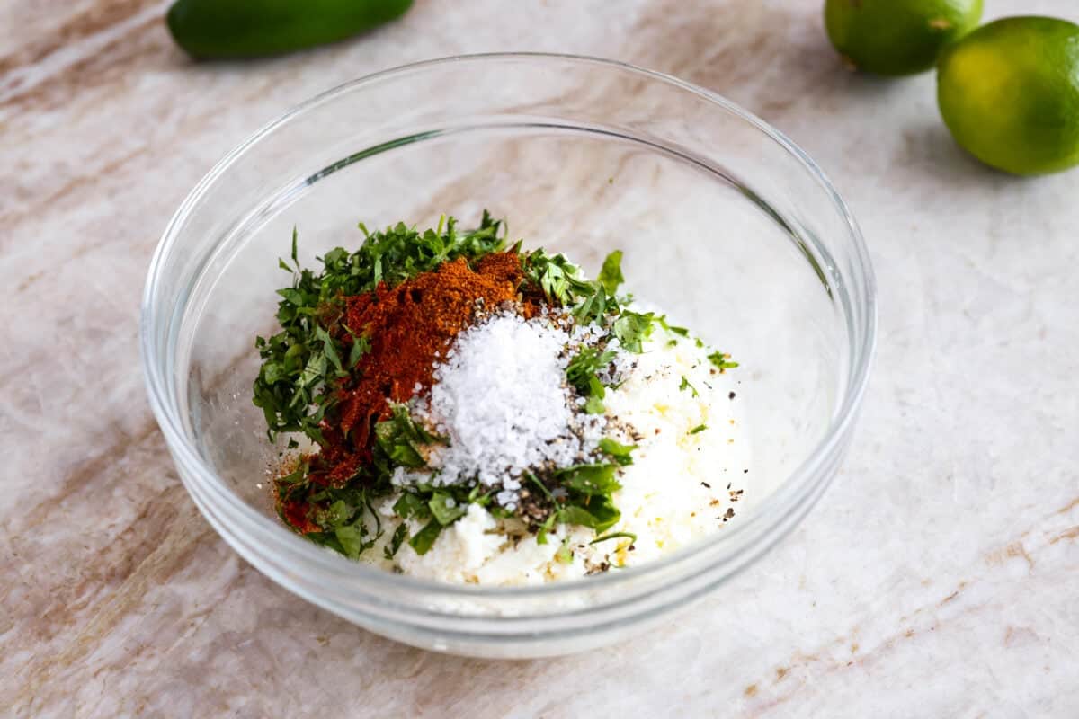 Elote sauce ingredients in a bowl. 