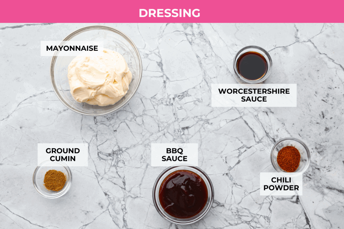Overhead shot of labeled dressing ingredients. 