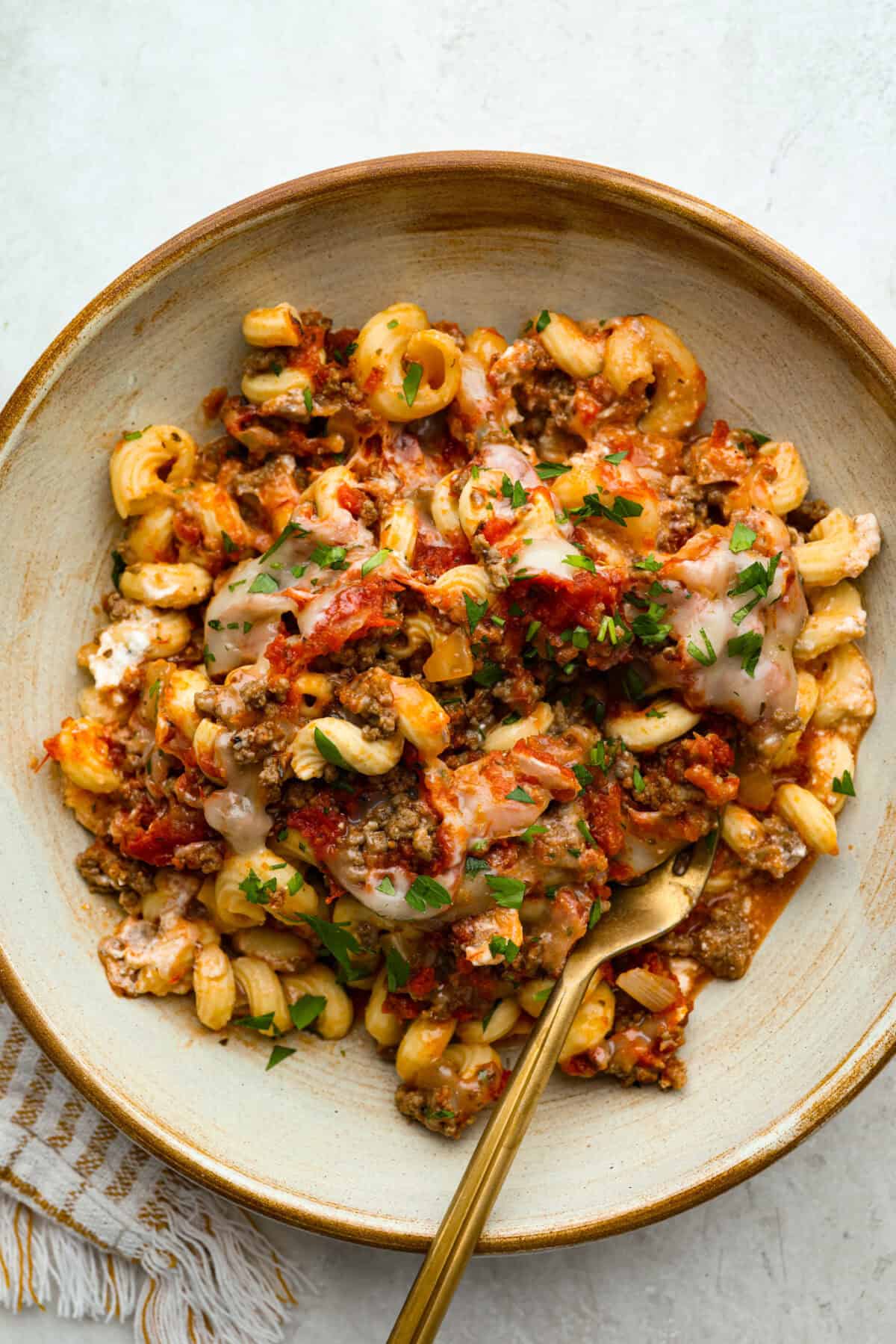 Individual serving of crockpot million dollar pasta in a bowl. 
