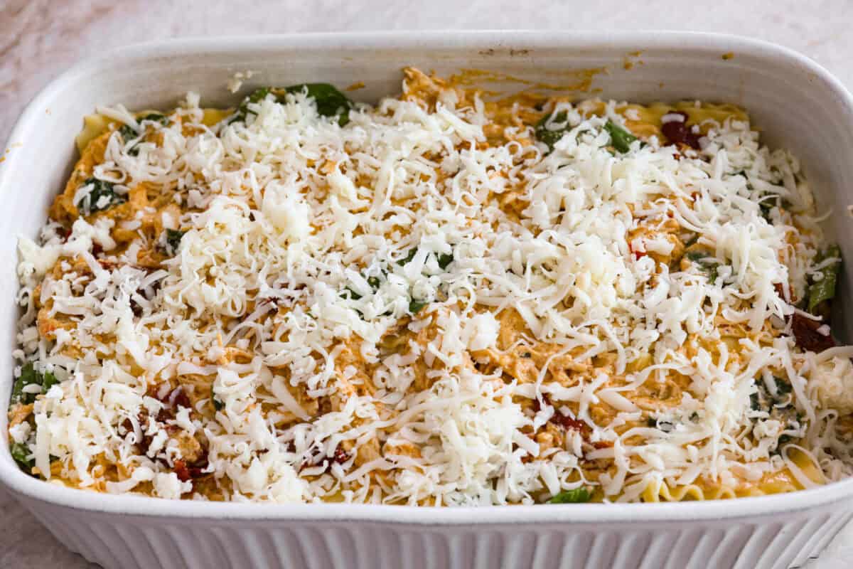 Last layer of cheese added to the top of the marry me lasagna ready to be covered with foil before it goes into the oven. 