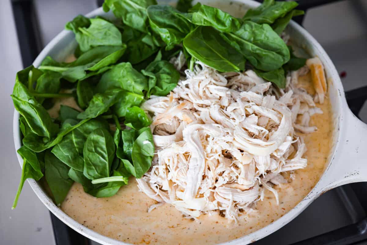 Chicken and spinach added to the marry me lasagna sauce. 