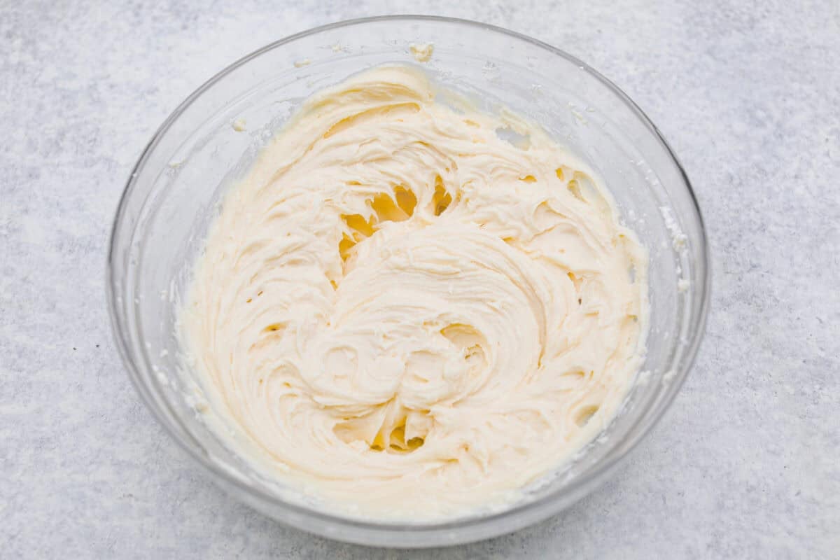 Sugar and vanilla added to the cream cheese and butter. 
