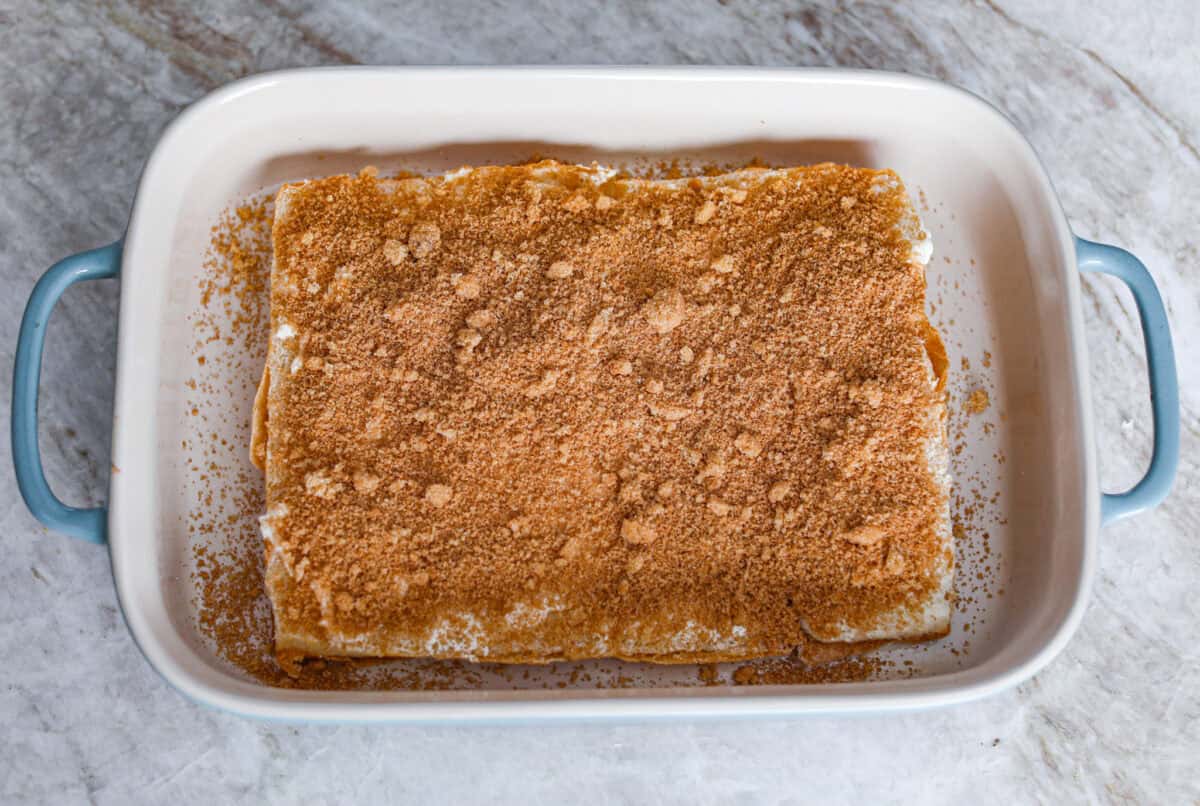 Cinnamon sugar mixture spread over the top of the butter on the bottom half of the rolls. 