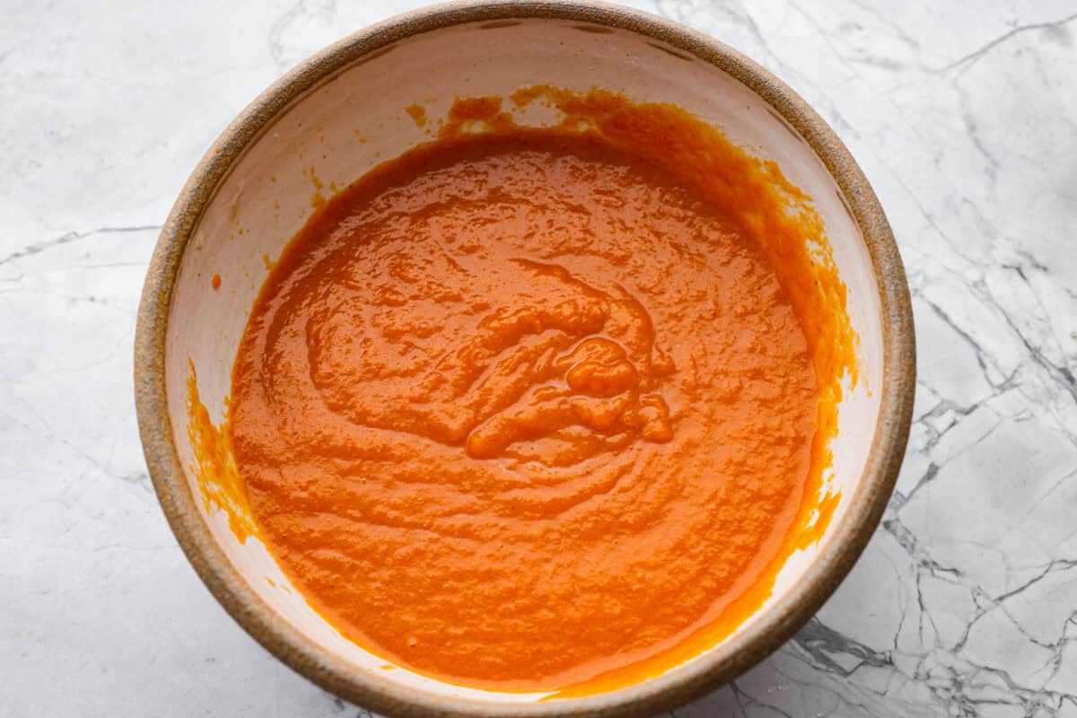 Bowl of wet ingredients mixed together.