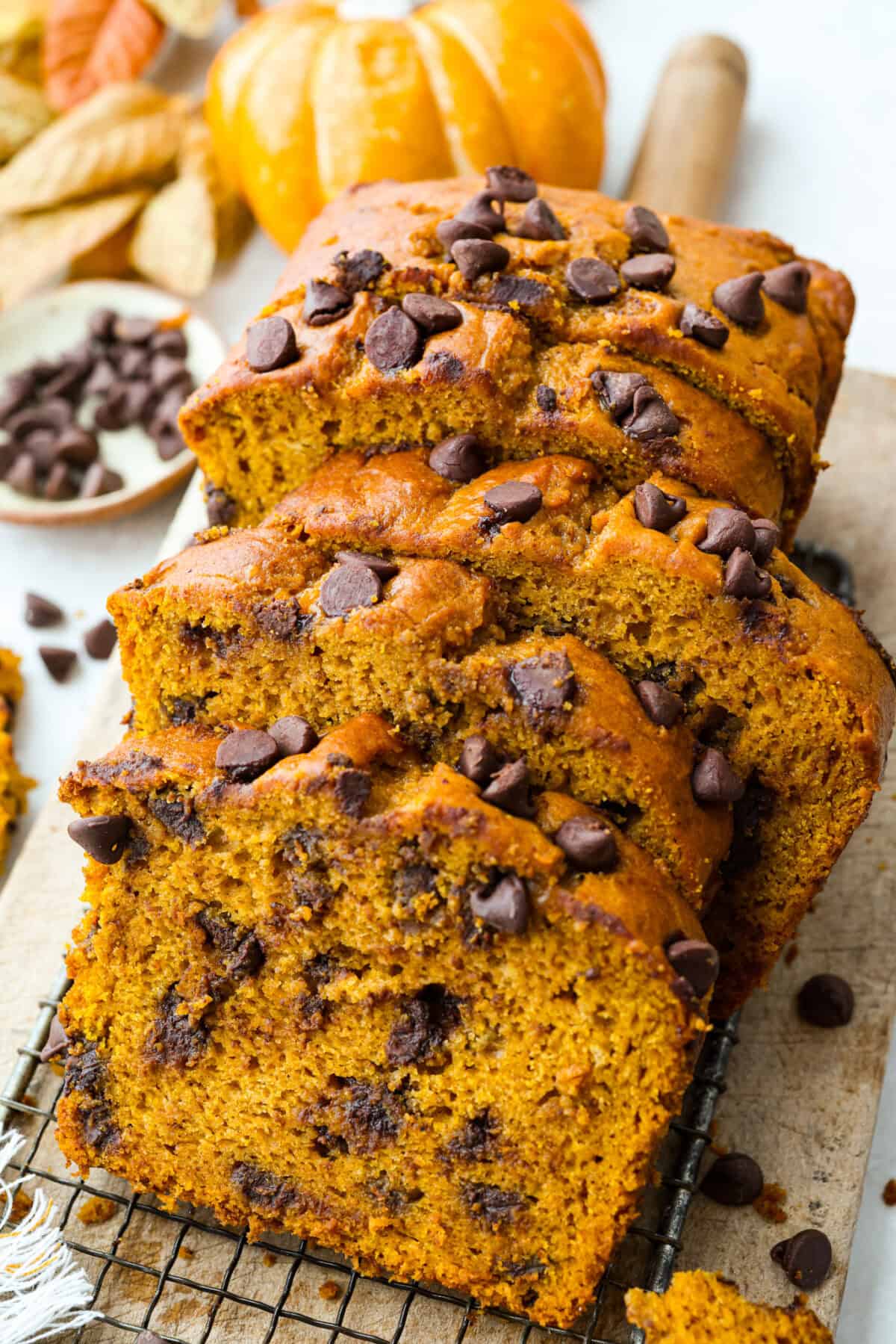Pumpkin chocolate chip bread loaf cut in slices. 