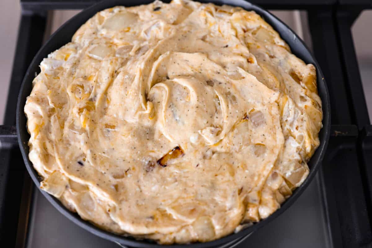 Cheese and other ingredients all mixed together, ready to go into the oven. 