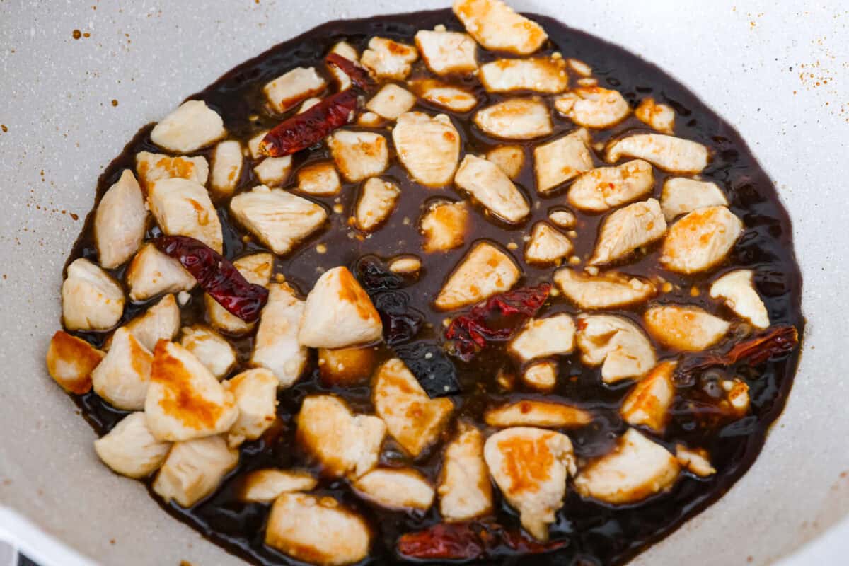 Sauce added to the chicken and peppers. 