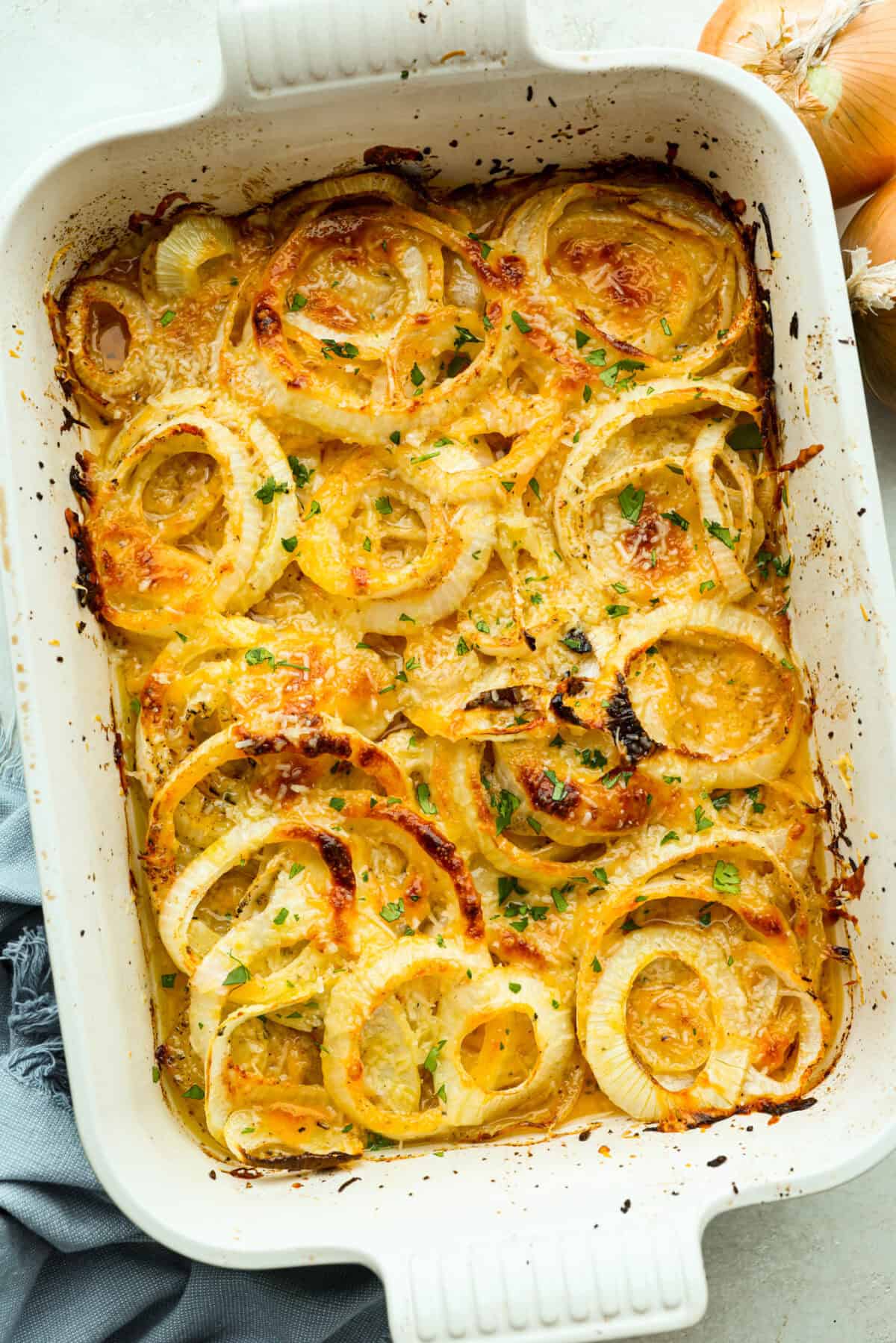 Overhead shot of baked Tennessee onions in the baking dish. 