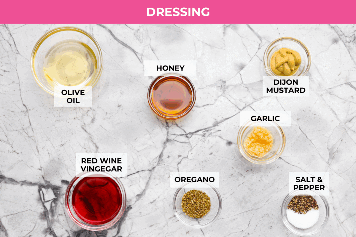 Overhead shot of labeled dressing ingredients. 