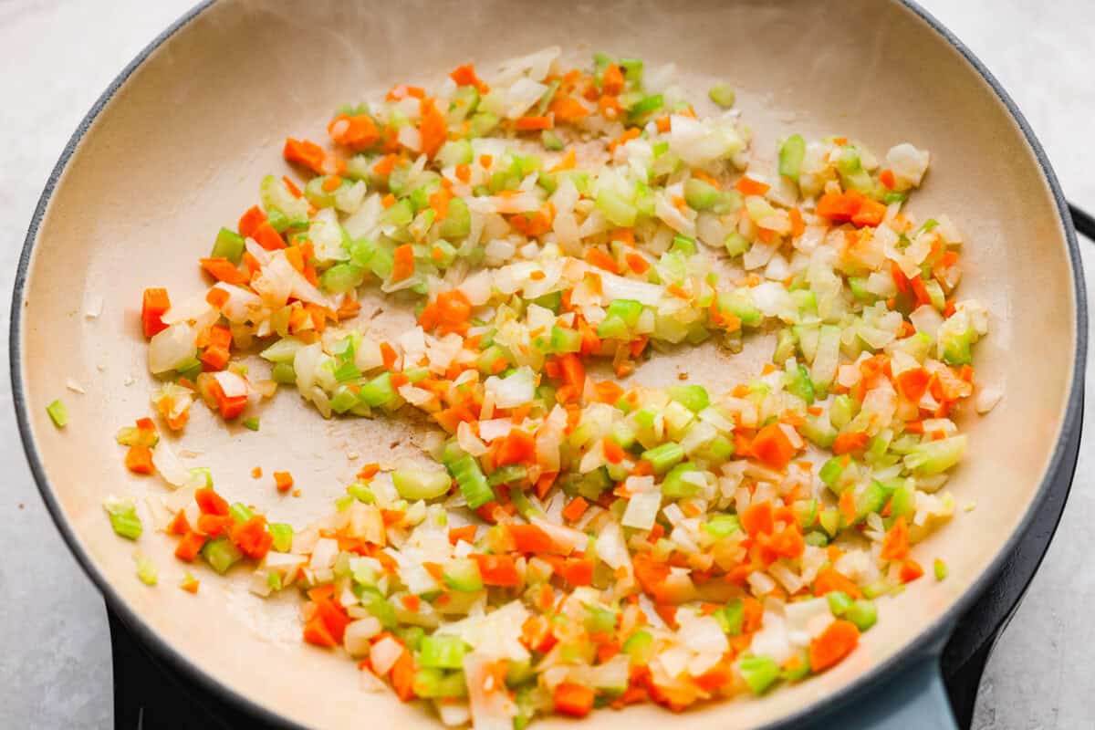 Veggies cooking in a skillet.