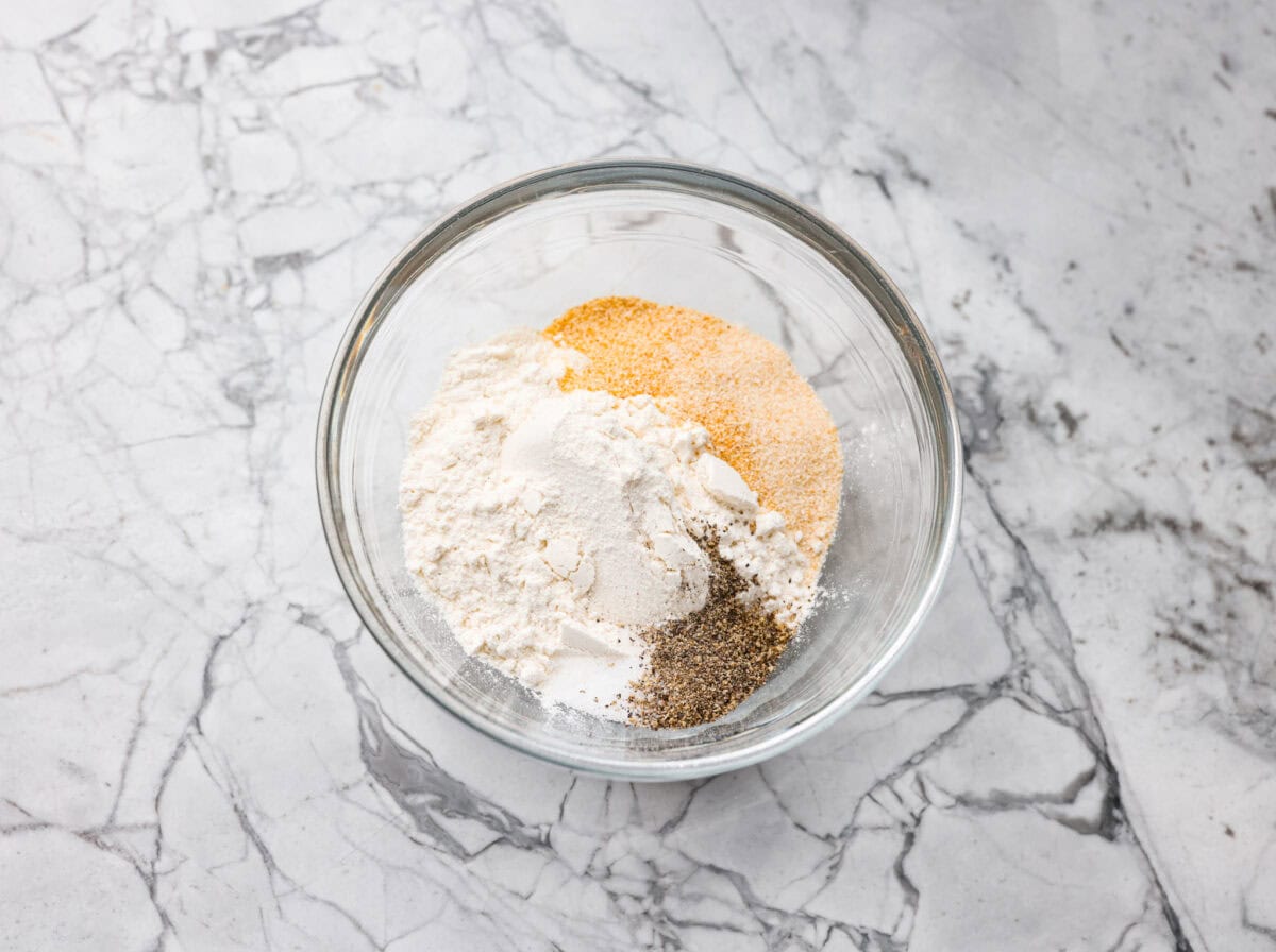 Seasonings and flour in a small bowl.