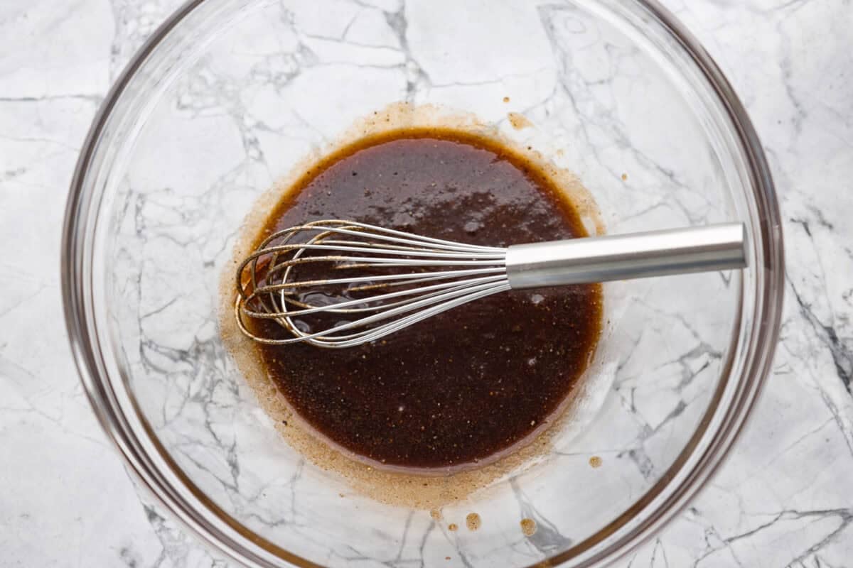 Bowl of sauce ingredients whisked together. 