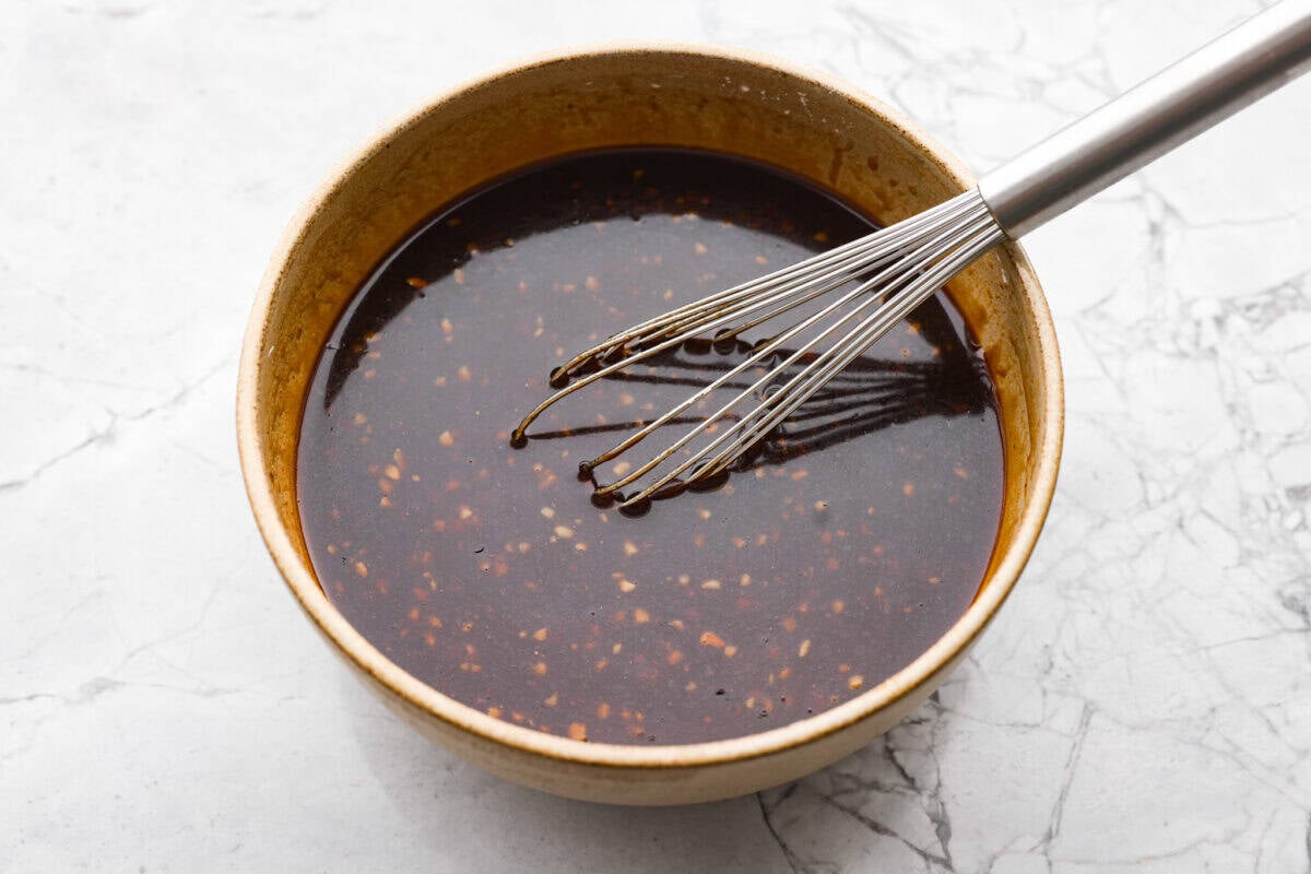 Sauce ingredients whisked together in a bowl.