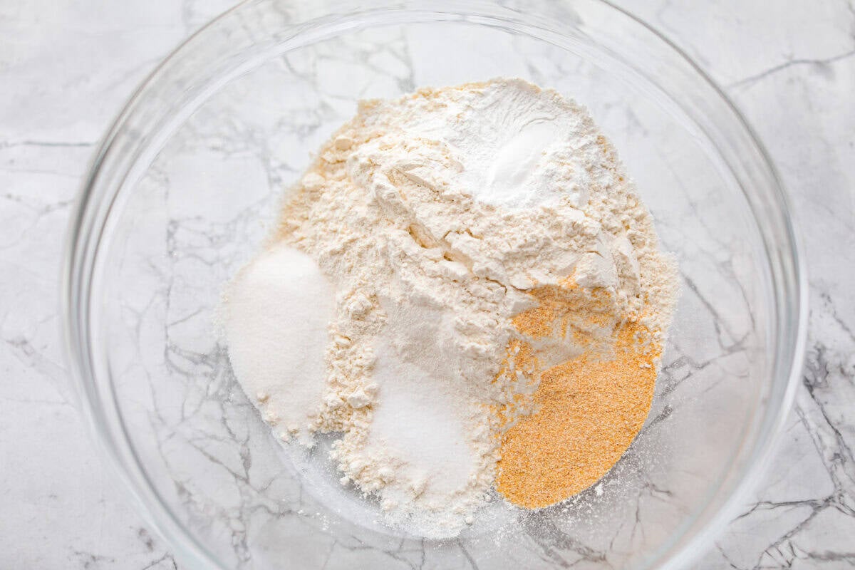 Mixing bowl full of dry ingredients. 