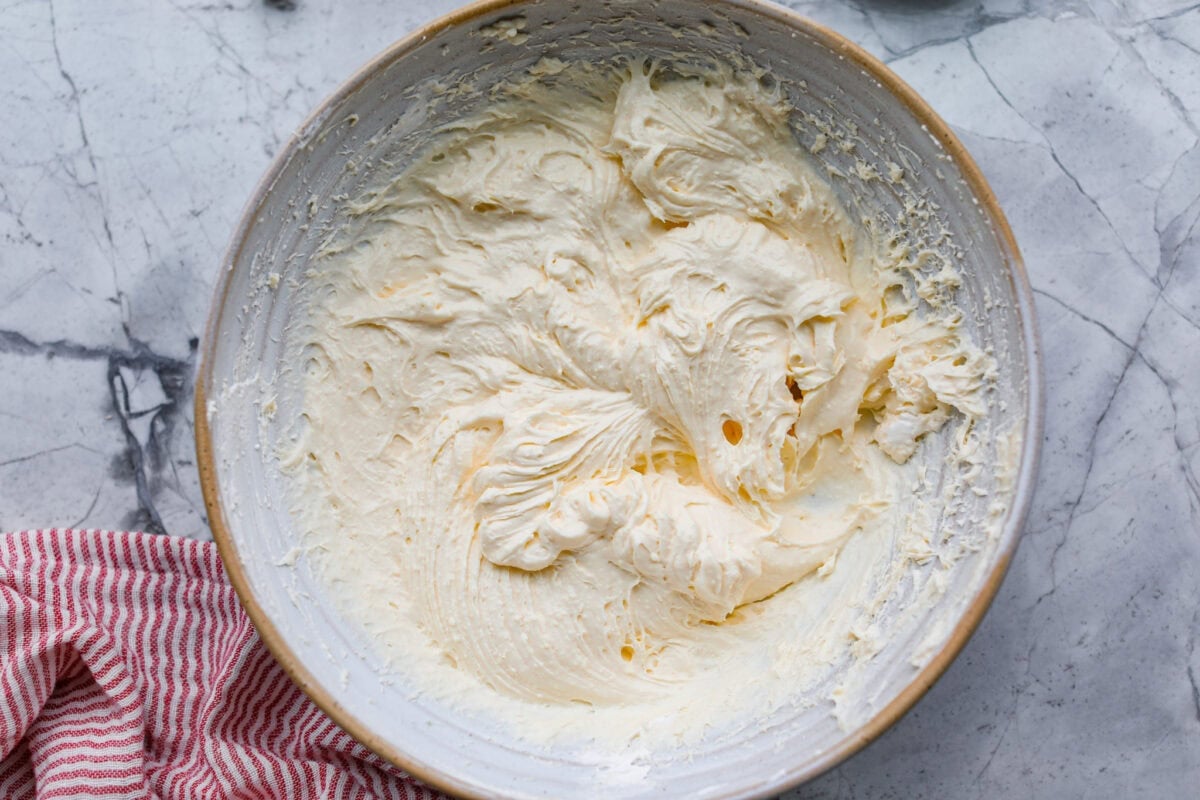 Cream cheese, pudding mix, and whipped topping all mixed together.