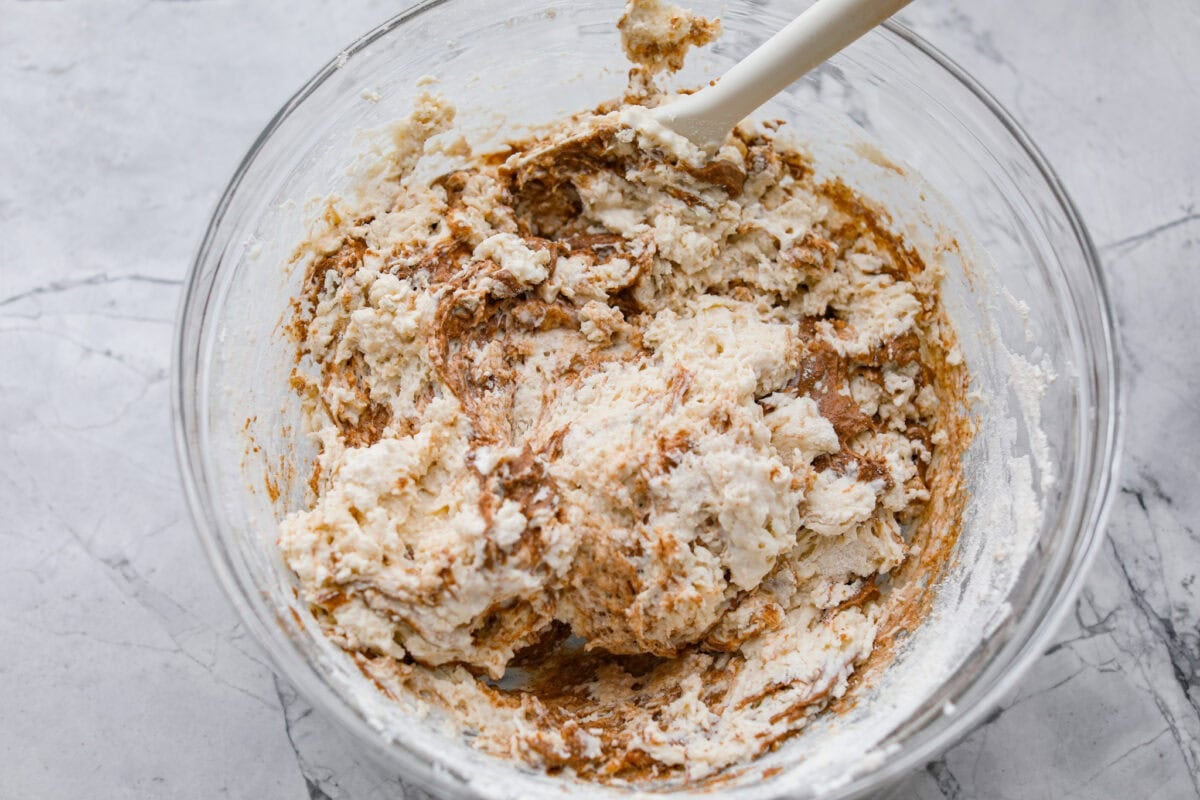 These cinnamon roll butter swim biscuits are my cheat code to making "cinnamon rolls." They bake up soft and fluffy with a sweet cinnamon swirl and icing on top. They disappear almost as fast as you can make them! Cinnamon sugar mixture combined with the buttermilk biscuit mixture.