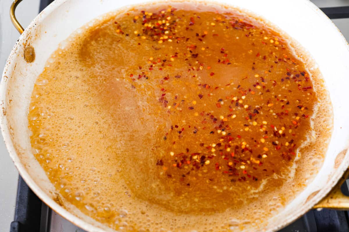 Sauce simmering in a skillet. 