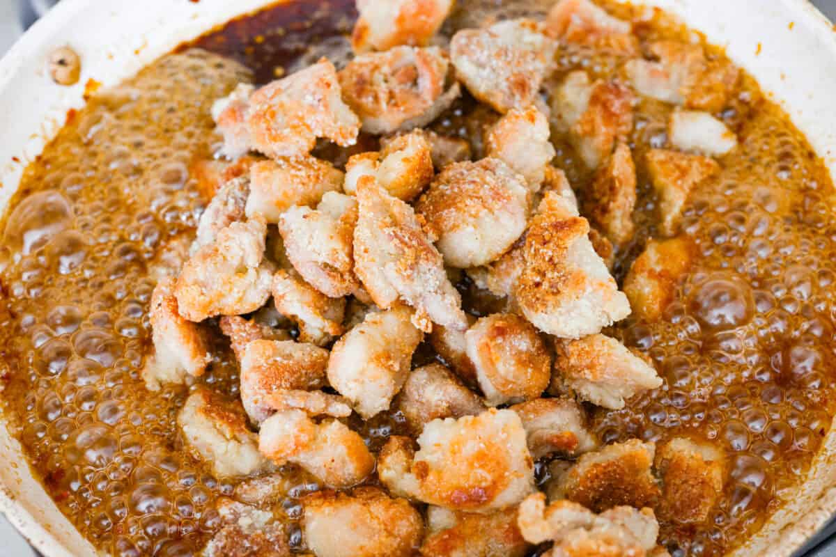 Cooked chicken added back to the skillet with the sauce. 