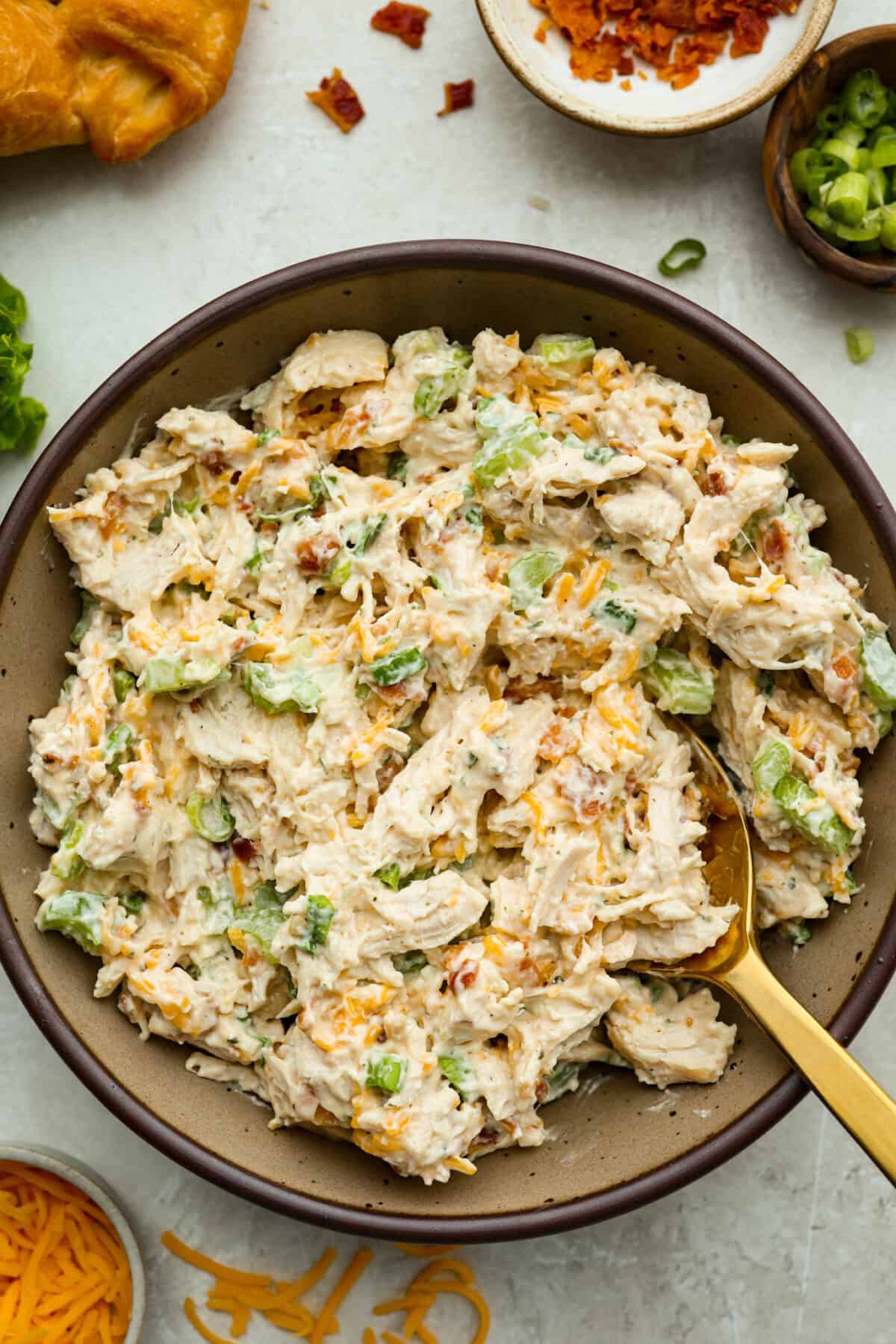 This crack chicken salad has no business being this good! It’s creamy, packed with ranch, bacon, and cheddar, and disappears way too fast. Pile it on a croissant or eat it straight from the bowl. I promise I won't judge! Bowl of crack chicken salad.