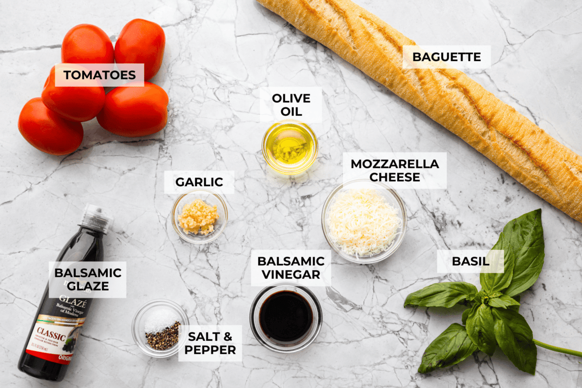 Overhead shot of labeled bruschetta ingredients. 
