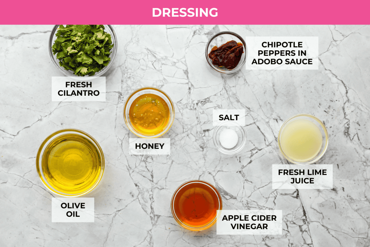 Overhead shot of labeled dressing ingredients. 