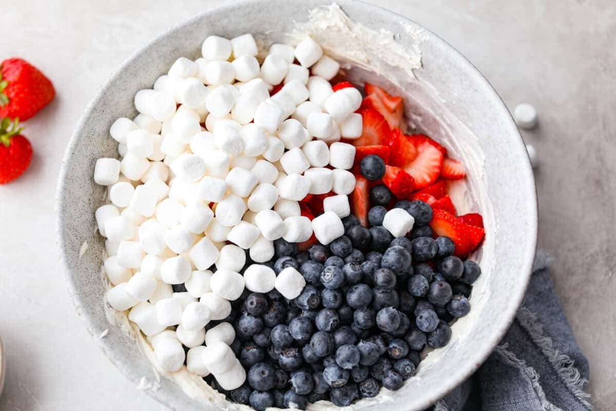 Marshmallows, and berries added to the yogurt mixture. 