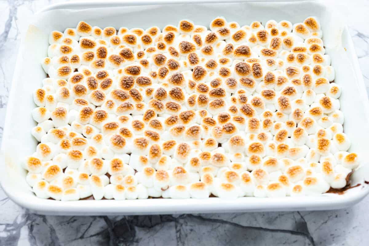 Remember the Starbucks s'mores bars everyone was obsessed with? They're back in homemade form! These easy bars have a buttery graham cracker crust, melty chocolate, and toasted marshmallows for the ultimate no-campfire-required treat. Mini marshmallows added to the top of the chocolate and toasted using the broiler in the oven.