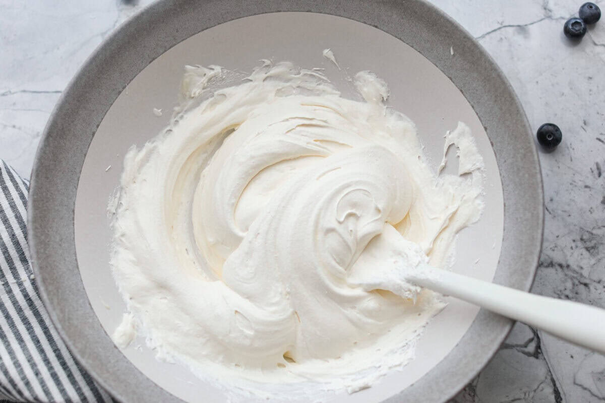 3 ingredient blueberry fluff is creamy, fruity, and ready in just 5 minutes! It’s the perfect last-minute dessert for potlucks, summer parties, or anytime you need something sweet without turning on the oven. Sweetened condensed milk and whipped topping mixed together.