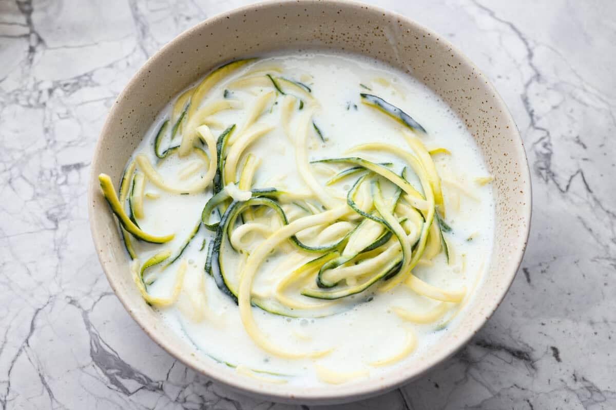 These crispy zucchini strings are golden, crunchy, and seriously hard to stop eating. Lightly battered and fried until perfectly crisp, they turn simple zucchini into an addictive snack or side dish that everyone will reach for first. Zucchini strings in buttermilk.
