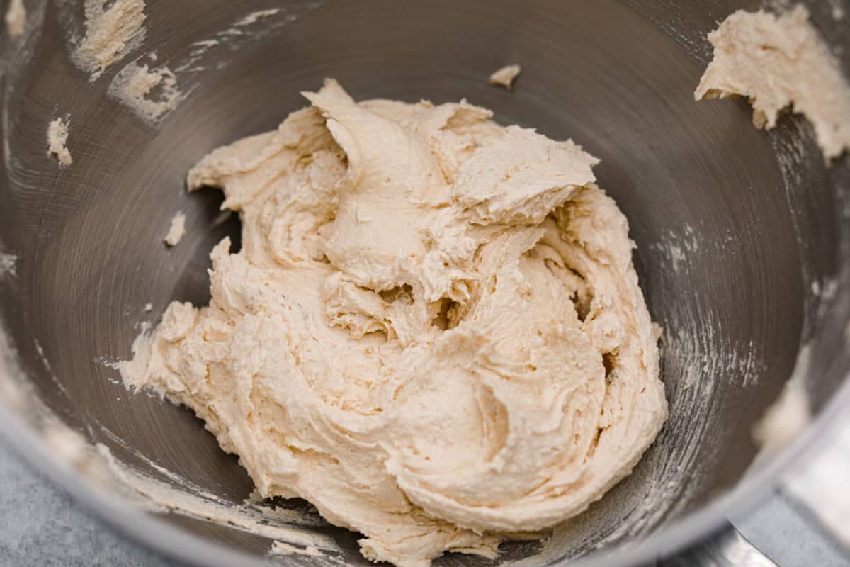 Jacques Torres Chocolate Chip Cookies come from the famous “Mr. Chocolate” himself. They were featured in The New York Times’ search for the perfect chocolate chip cookie. The secret is letting the dough rest before baking. It gives you crisp, buttery edges and chewy centers. Butter and sugar creamed together.