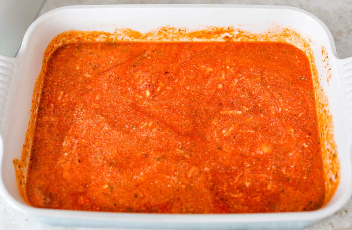 Want lasagna but absolutely cannot deal with all that layering tonight? Let me help you. This lazy meatball lasagna is cheesy, cozy, ridiculously easy, and exactly the kind of dinner we need on a busy night. Ricotta cheese mixed in with the marinara sauce.
