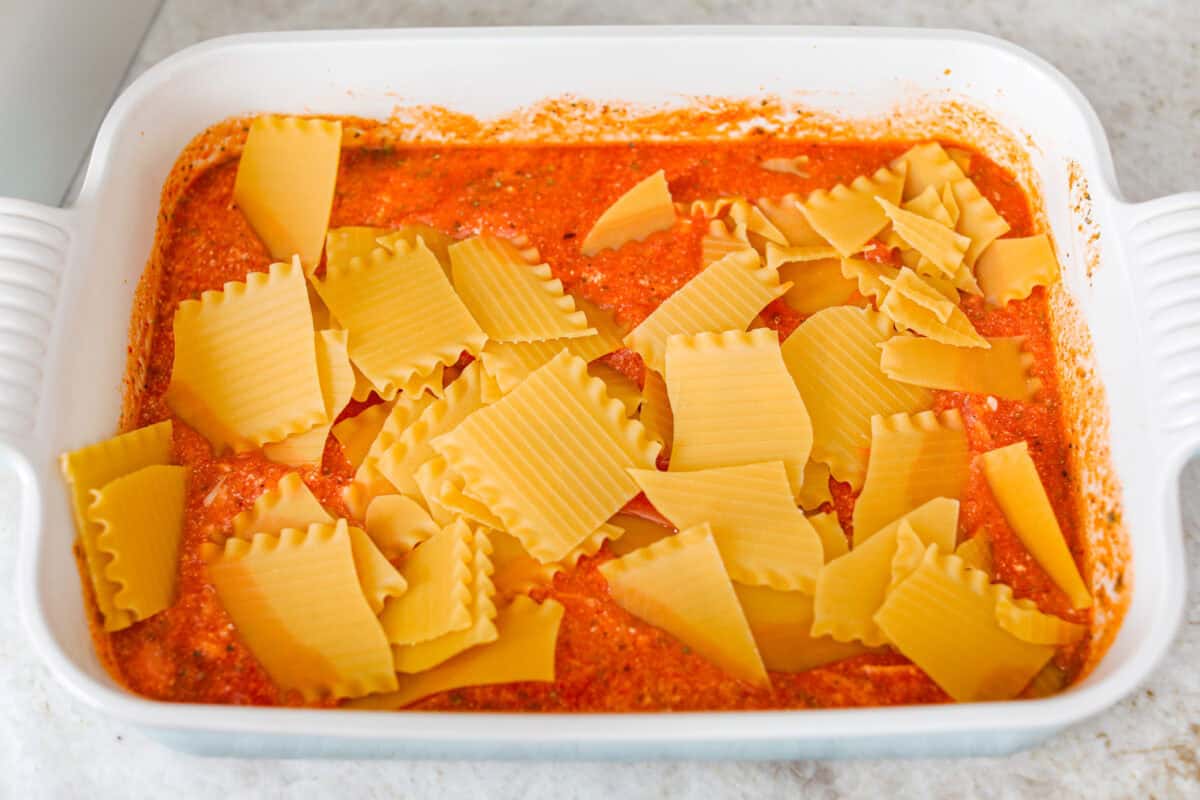 Want lasagna but absolutely cannot deal with all that layering tonight? Let me help you. This lazy meatball lasagna is cheesy, cozy, ridiculously easy, and exactly the kind of dinner we need on a busy night. Lasagna noodles broken apart and added to the sauce and cheese mixture.