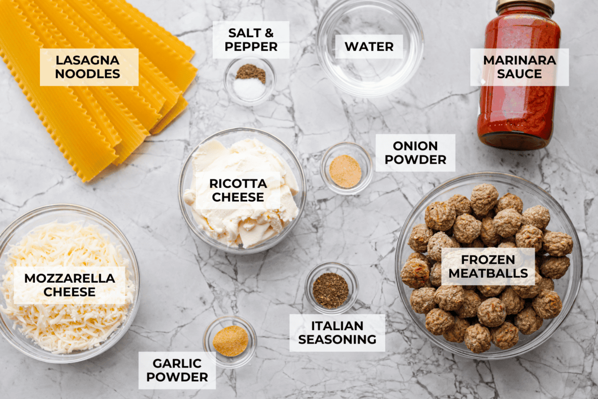 Want lasagna but absolutely cannot deal with all that layering tonight? Let me help you. This lazy meatball lasagna is cheesy, cozy, ridiculously easy, and exactly the kind of dinner we need on a busy night. Overhead shot of labeled lazy meatball lasagna ingredients.